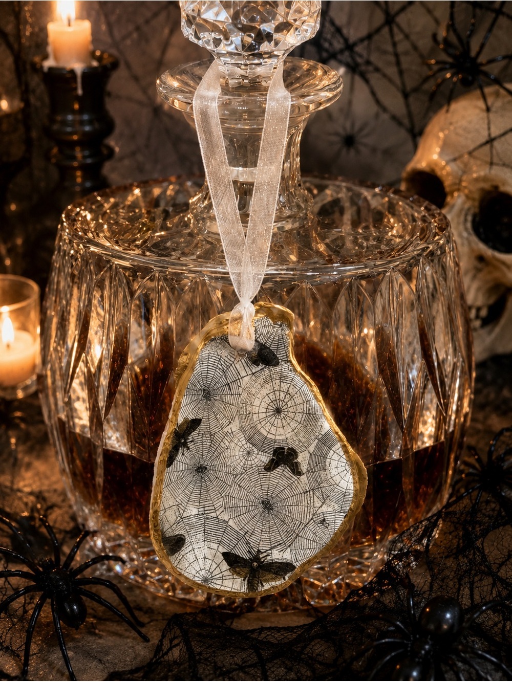 Hand crafted spider web and moth oyster shell ornament 7”